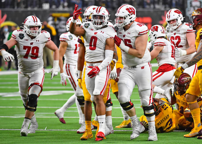 Running back Braelon Allen celebrates a first down run against Arizona State in the Las Vegas Bowl (Credit: Stephen R. Sylvanie-USA TODAY Sports)